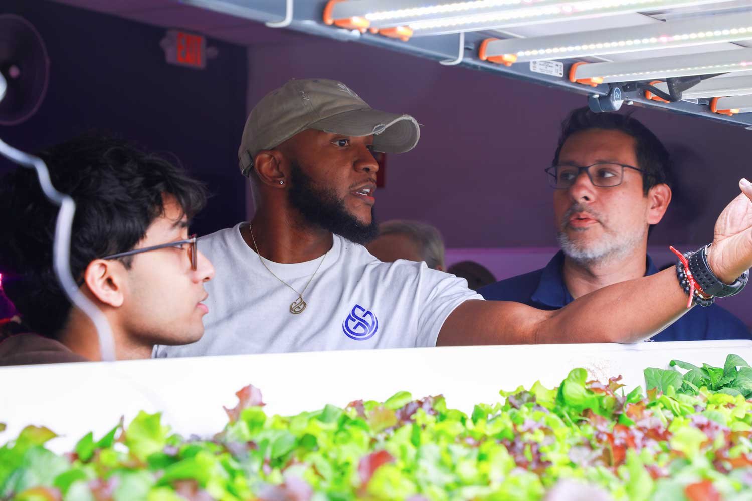 Desmond Hayes sharing his hydroponic growing expertise with visitors